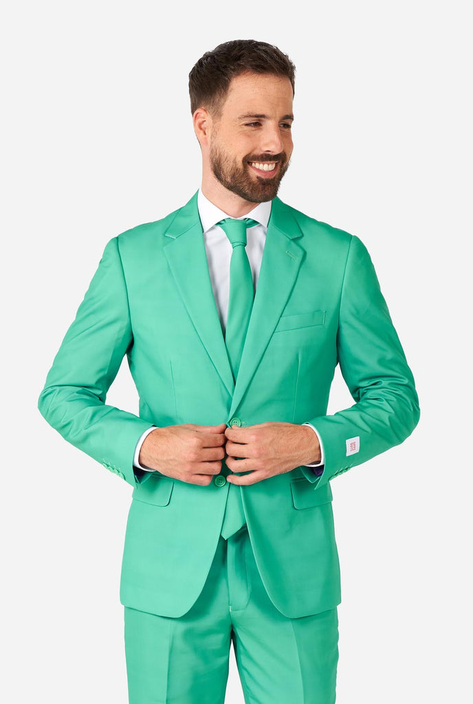 Man draagt ​​turquoise gekleurd pak
