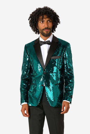 Man draagt een blauwgroene blazer met pailletten en zwarte satijnen revers.