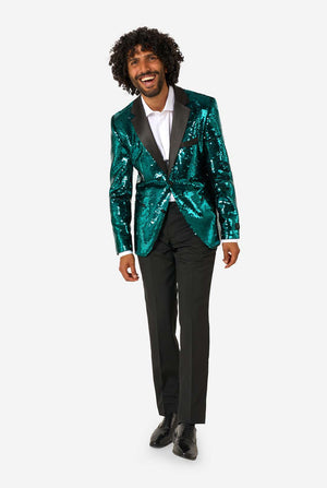 Man draagt een blauwgroene blazer met pailletten en zwarte satijnen revers.
