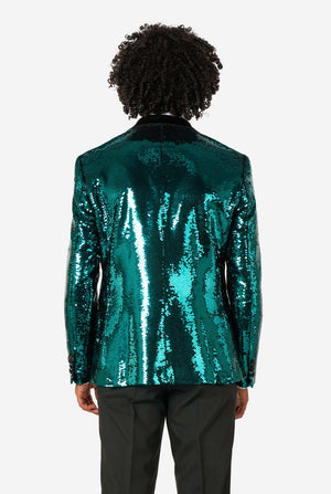 Man draagt een blauwgroene blazer met pailletten en zwarte satijnen revers.