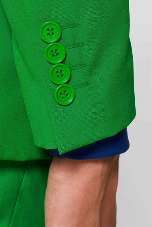 Man draagt groen herenpak en donkerblauw overhemd, mouw close -up