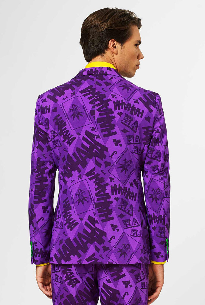 Het Joker -paarse pak gedragen door de mens