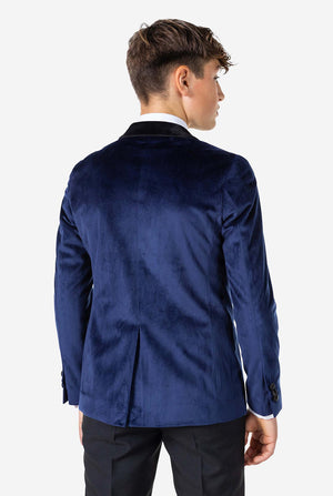 Tiener draagt Blue Velvet Christmas Dinner Jacket, bekijk vanaf de achterkant
