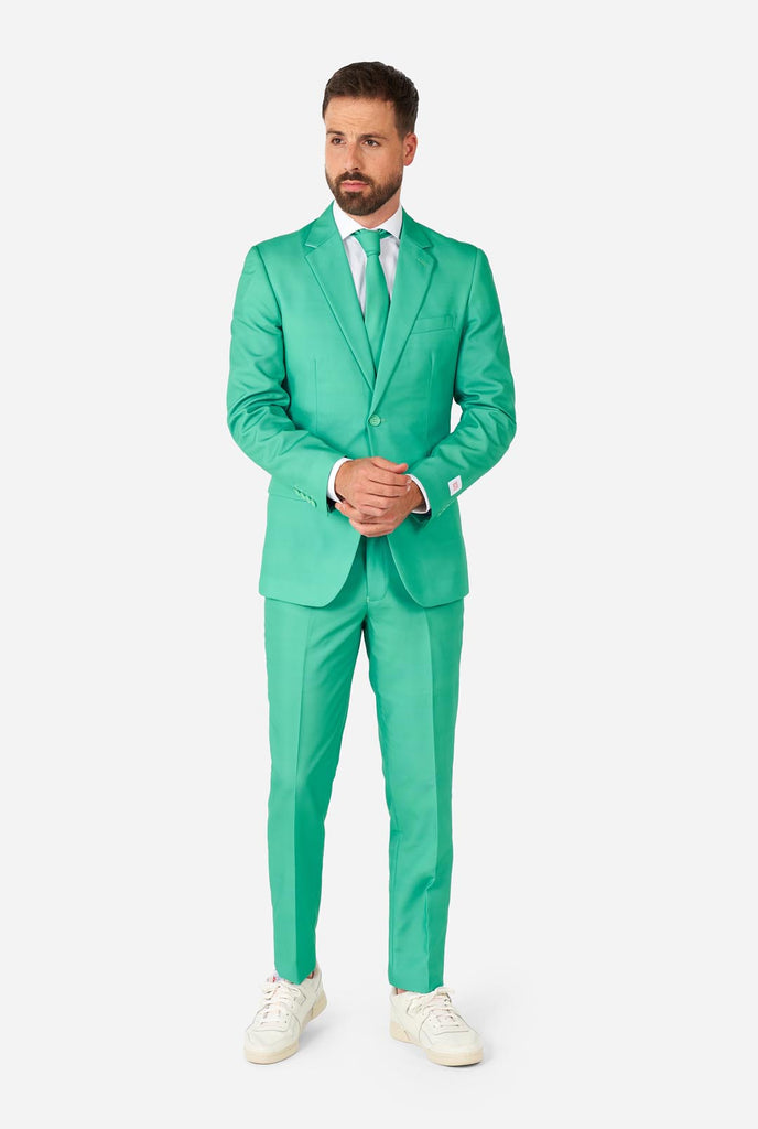 Man draagt ​​turquoise gekleurd pak