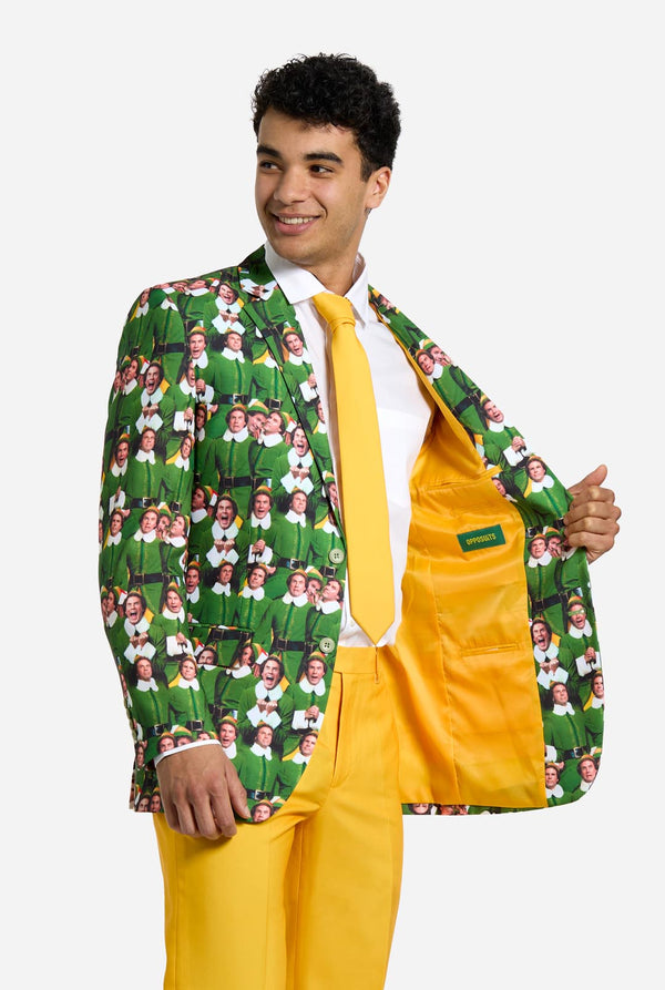 Man met kerstpak voor heren met het karakter ELF op het jasje en de gele broek.