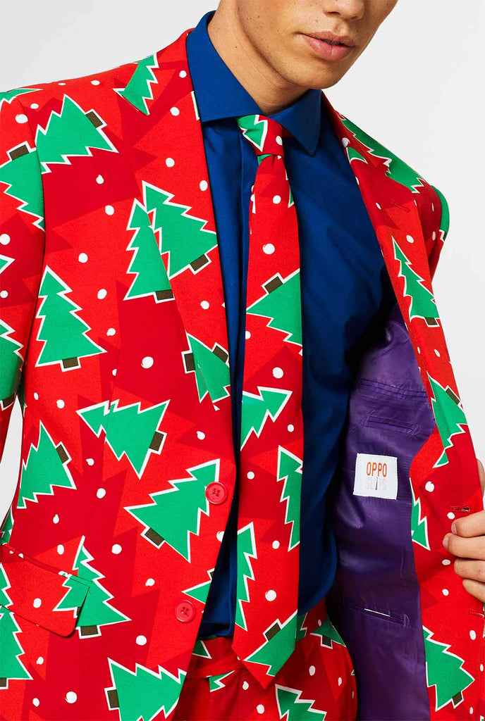 Red Christmas men's suit with pine tree print worn by man