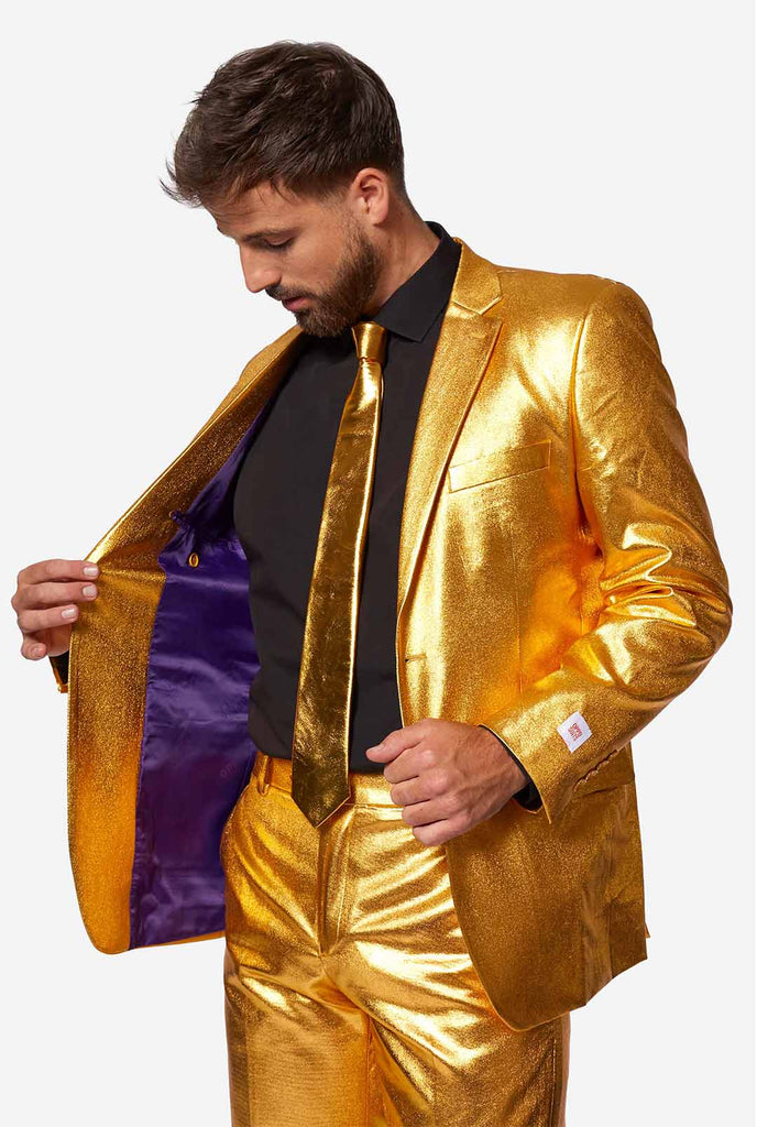 Gold men's party suit worn by man