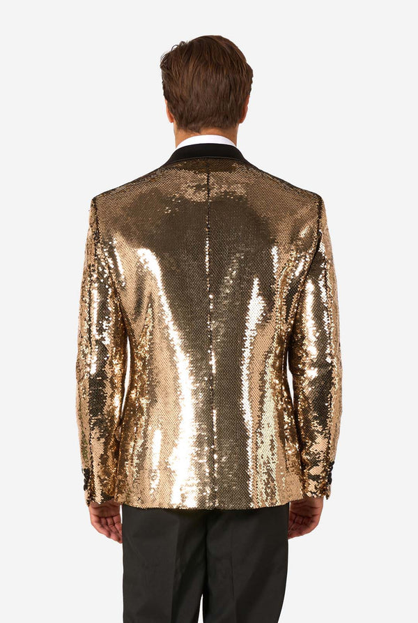 Man draagt ​​een glanzend gouden pailletten blazer met zwarte satijnen revers.