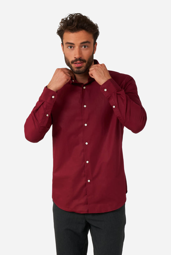 Man wearing burgundy red men's shirt
