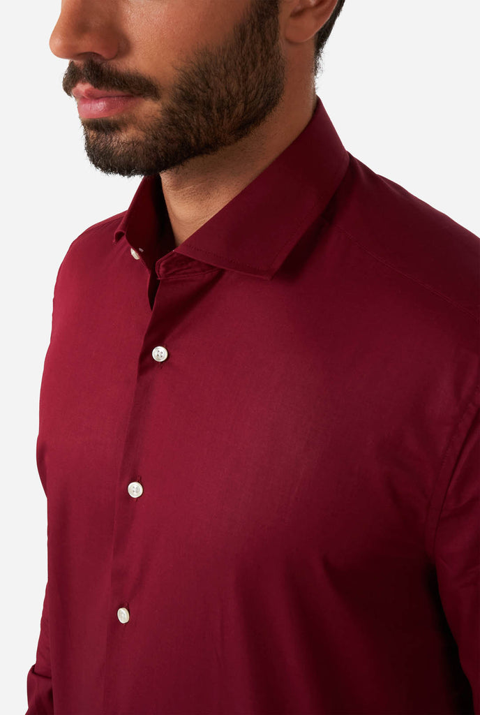 Man wearing burgundy red men's shirt, close up