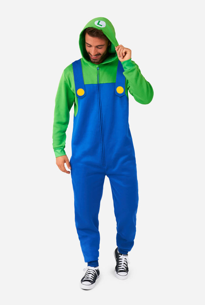 Man wearing unisex onesie with Luigi Super Mario print