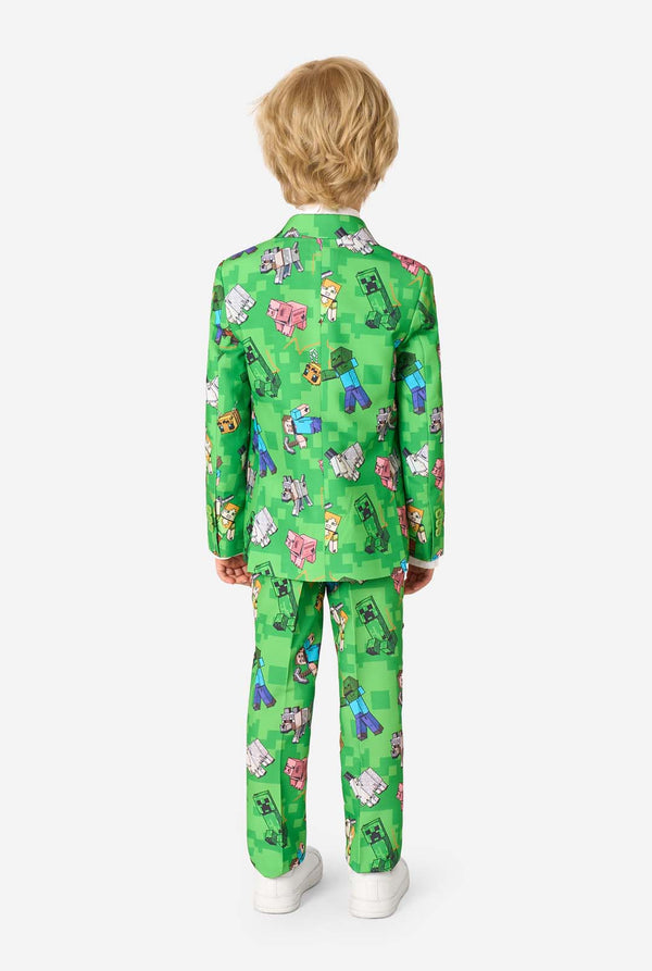 Achteraanzicht van het Minecraft-pak, met de gedetailleerde all-over pixelprint met Minecraft-mobs en -personages, gedragen door een kind.