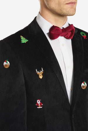 Man met zwarte kerstblazer met kerstpictogrammen, close up