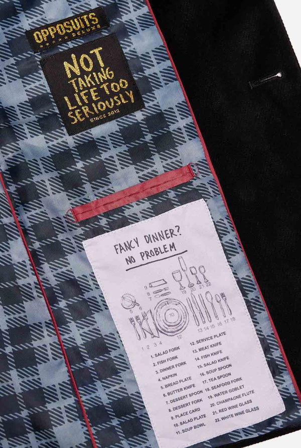 Zwarte kerstblazer met kerstpictogrammen, close-up van binnen
