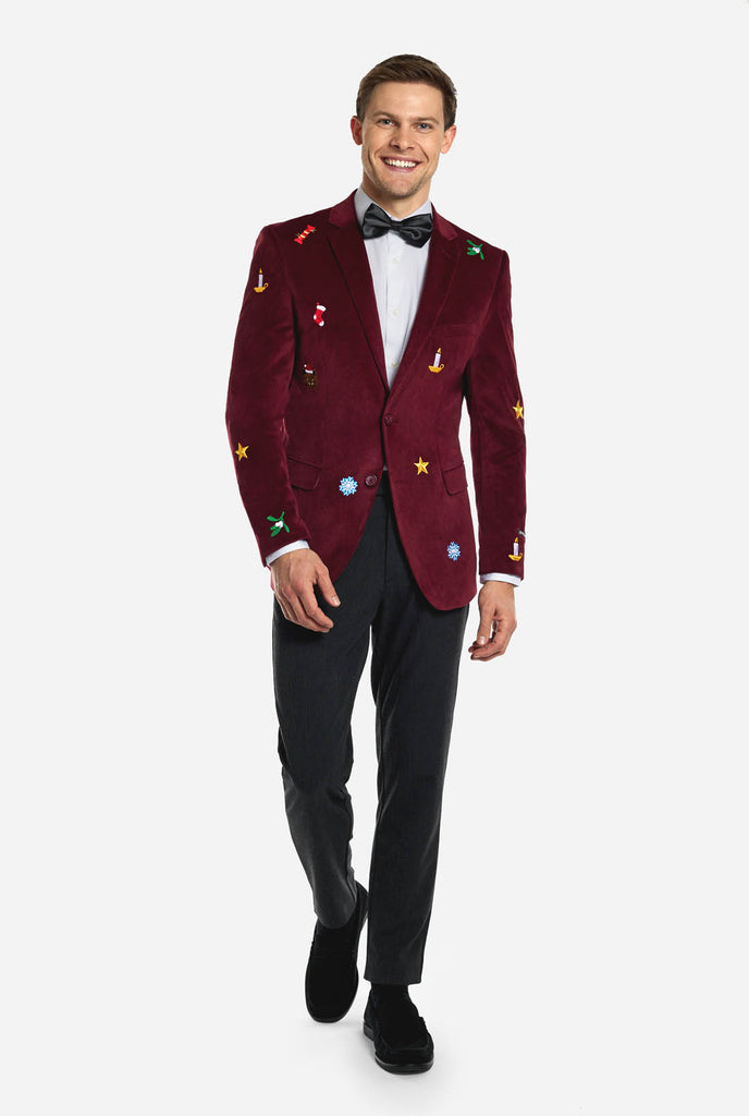 Man draagt bordeaux rode dinner jacket blazer met Kerst icoontjes