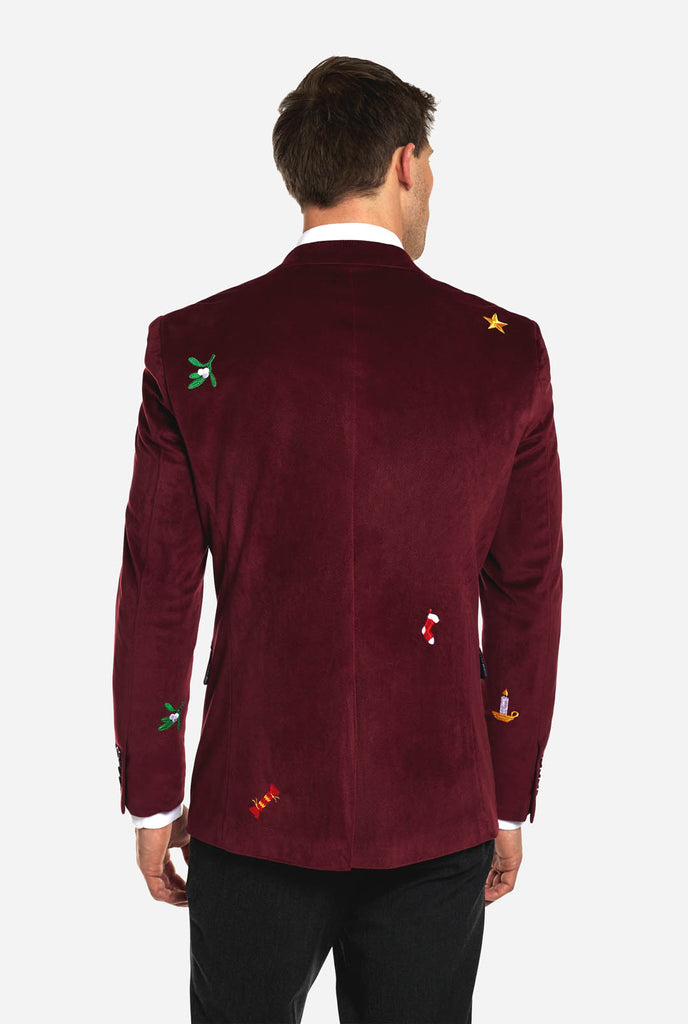Man draagt bordeaux rode dinner jacket blazer met Kerst icoontjes