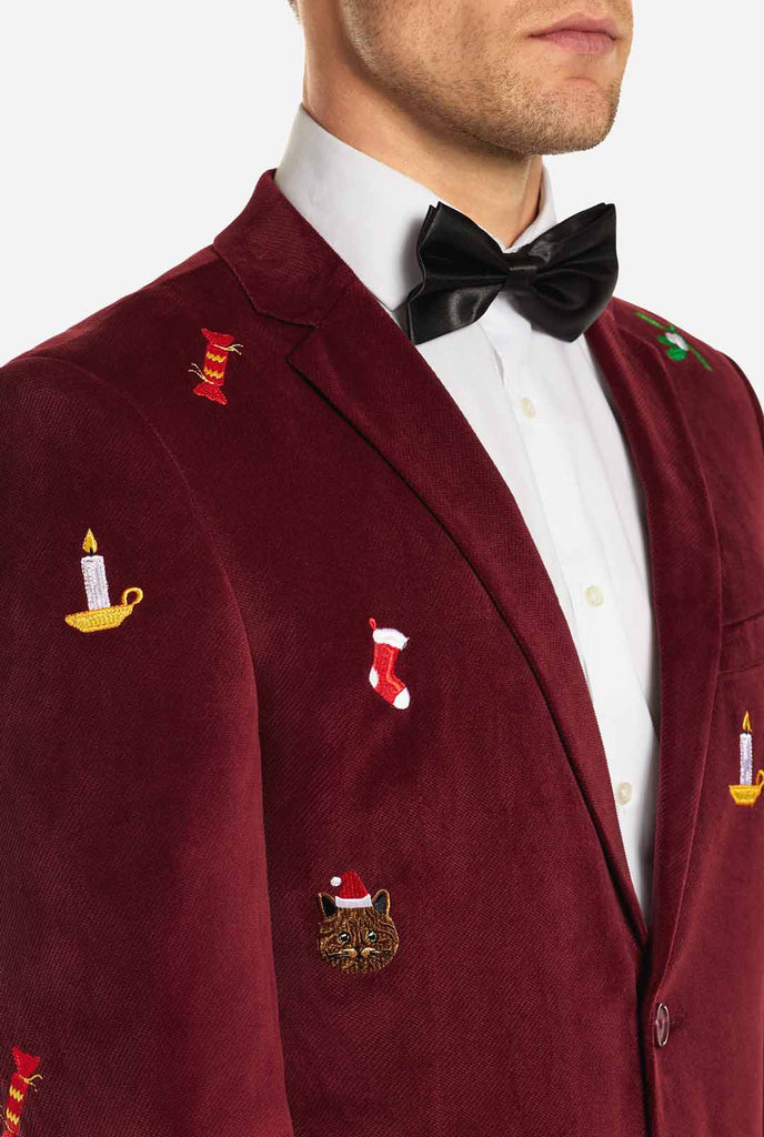 Man draagt bordeaux rode dinner jacket blazer met Kerst icoontjes