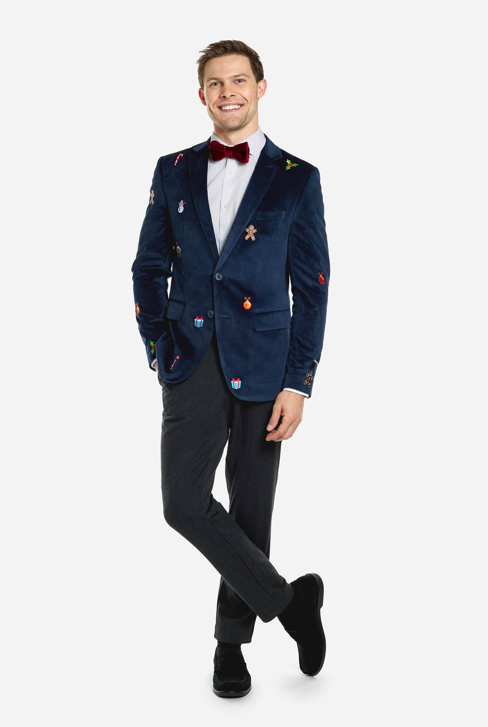 Man draagt blauwe dinner jacket blazer met Kerst icoontjes