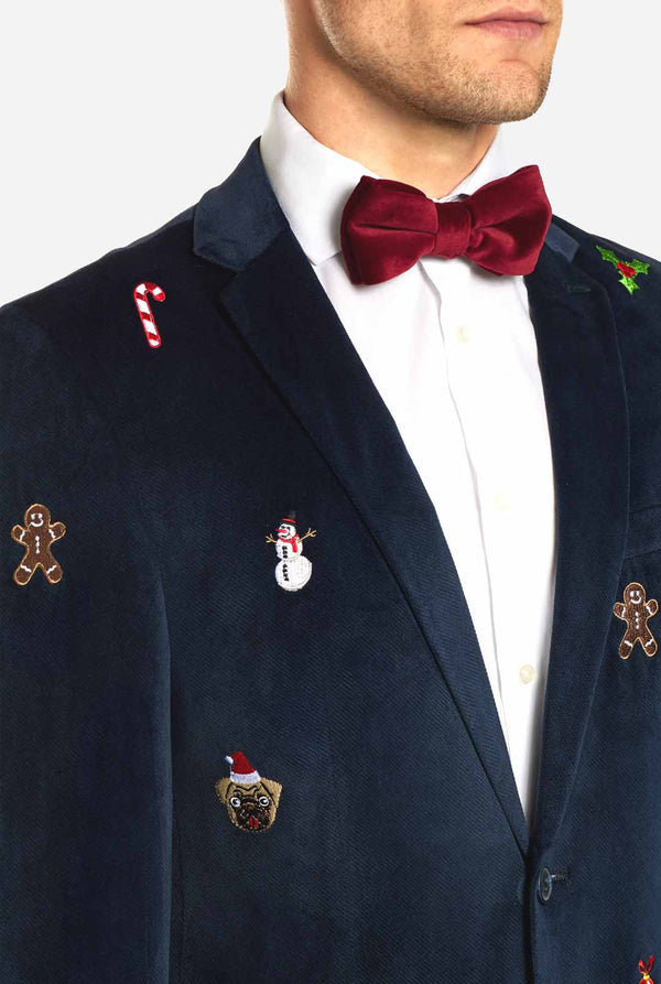 Man draagt blauwe dinner jacket blazer met Kerst icoontjes
