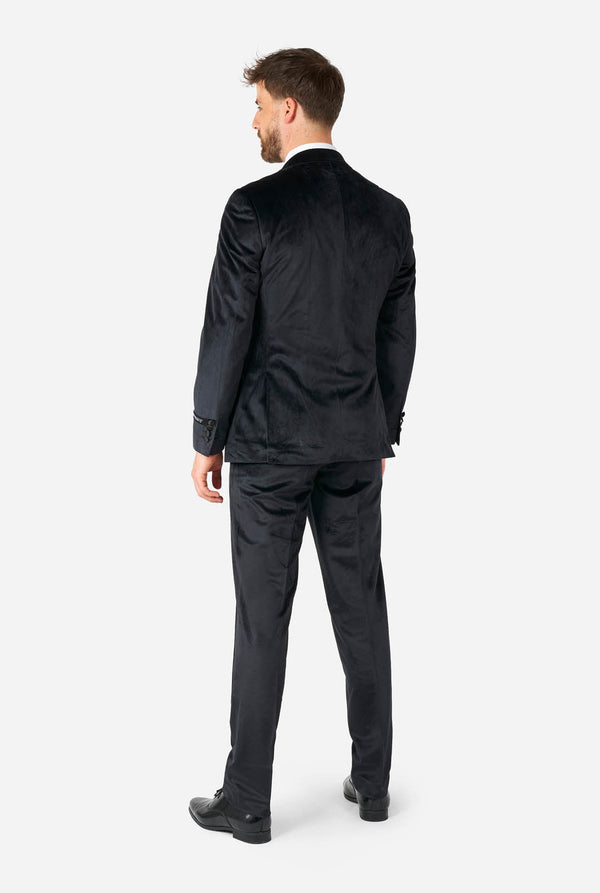 Man draagt zwarte velvet smoking