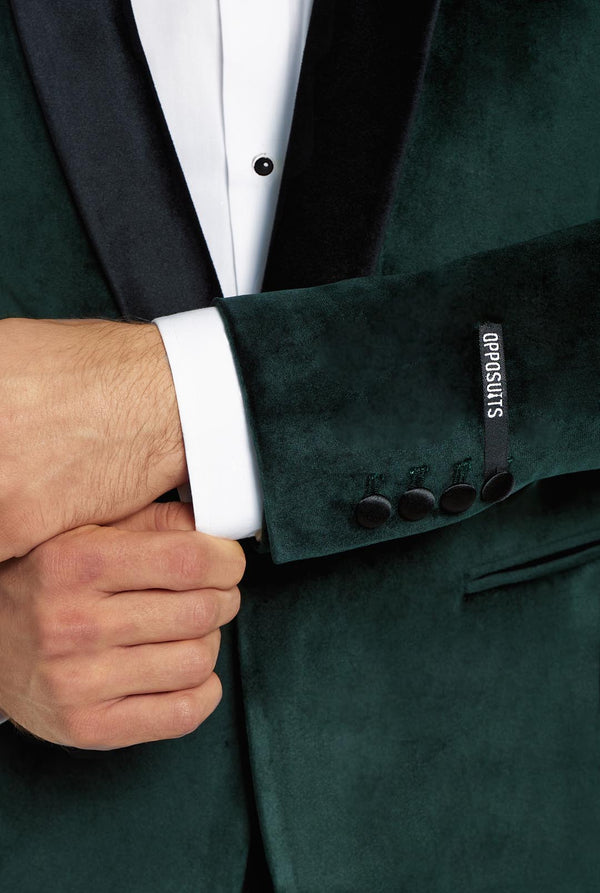 Man draagt groene dinner jacket blazer