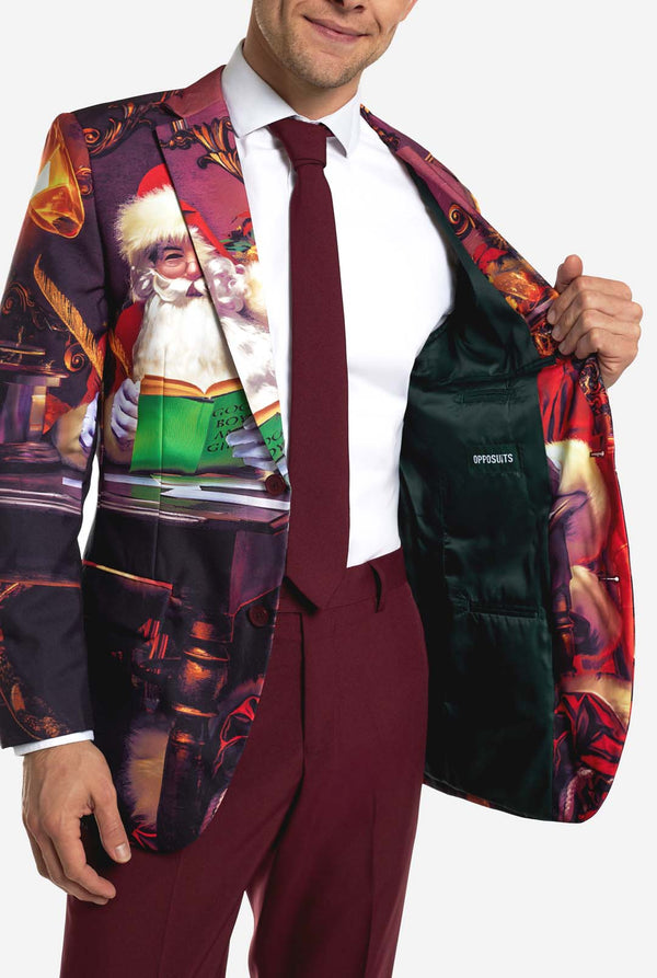 Man in bordeauxrood kerstpak met vintage kerstprint