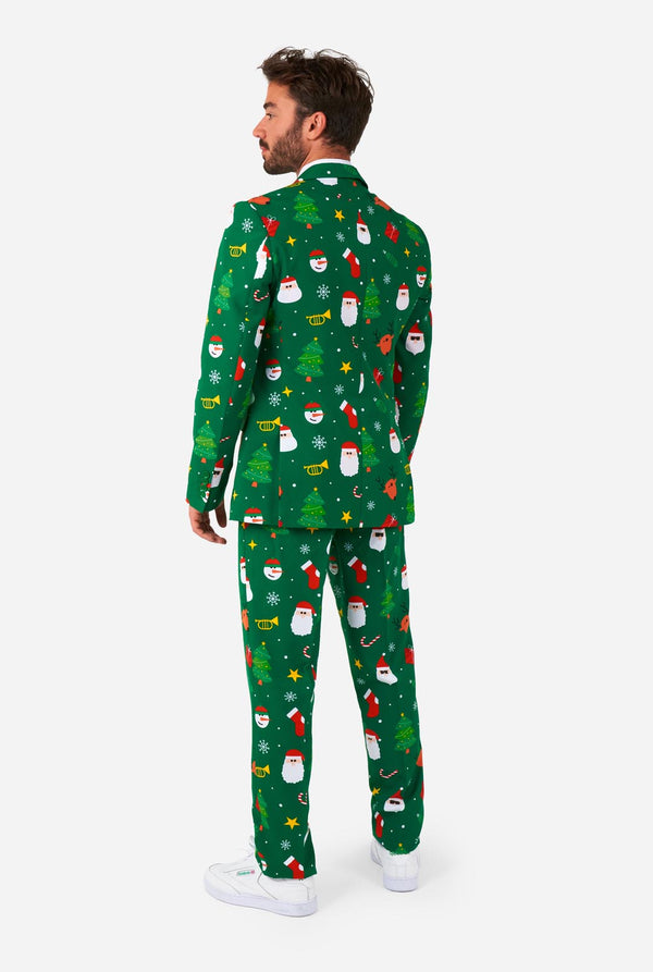 Man met groene kerstpakken voor mannen met kerstpictogrammen, zicht vanaf de achterkant