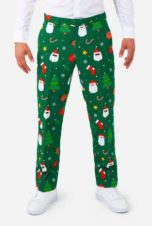 Man met groene kerstpakken voor mannen met kerstpictogrammen, close up van de broek