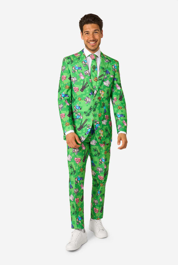 Volledig lichaamsbeeld van een man in een groen pak met Minecraft-thema van OppoSuits, glimlachend en zelfverzekerd poserend.