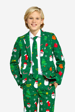 Jongen draagt groen Kerstpak voor tieners, met Kerst iconen.