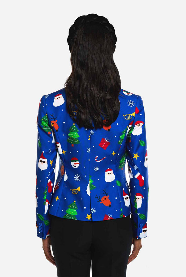 Vrouw draagt blauwe Kerstblazer voor dames, met Kersticonen.
