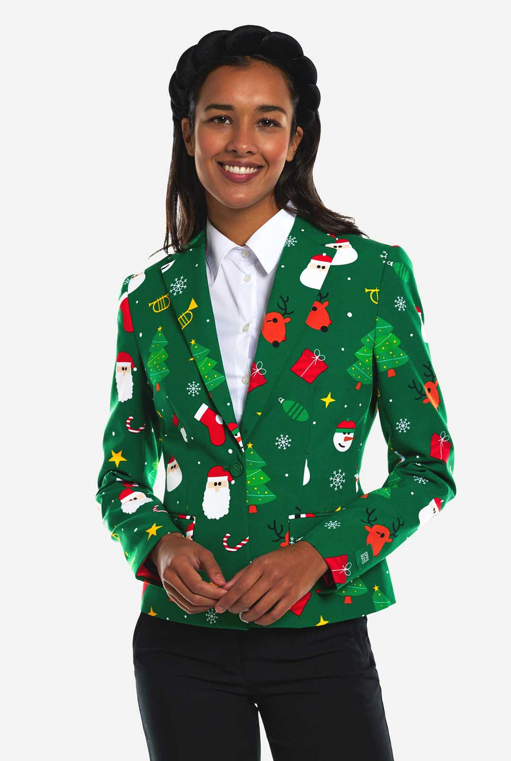 Vrouw draagt groene Kerstblazer voor dames.