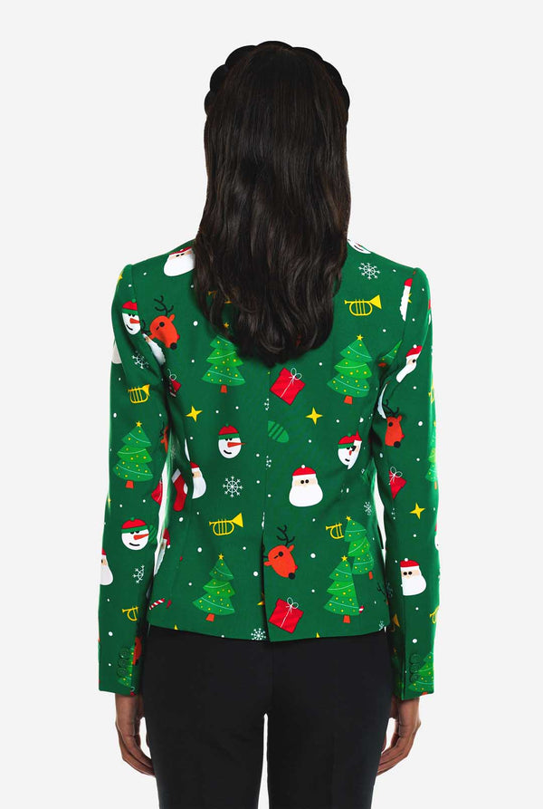 Vrouw draagt groene Kerstblazer voor dames.