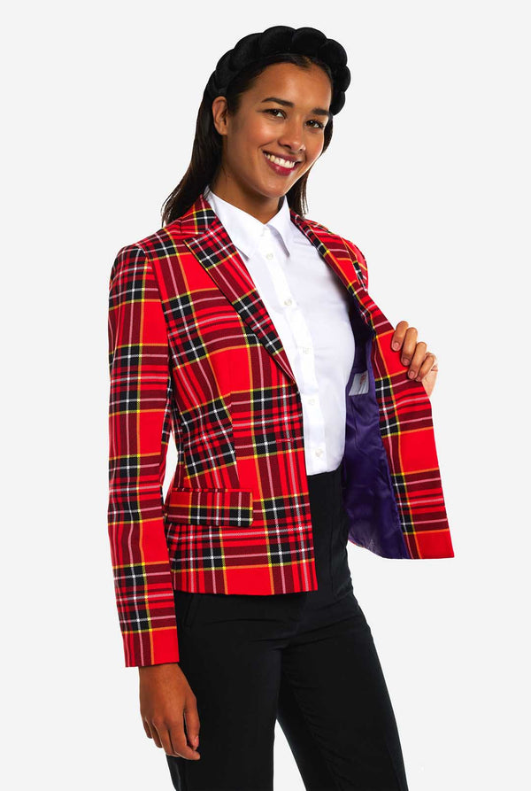Vrouw draagt damesblazer met tartan print