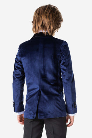 Jongen met blauw fluwelen kerstdiner jasje, bekijk vanaf de achterkant