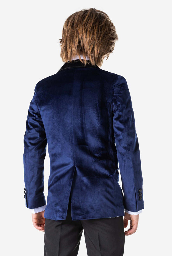 Jongen met blauw fluwelen kerstdiner jasje, bekijk vanaf de achterkant