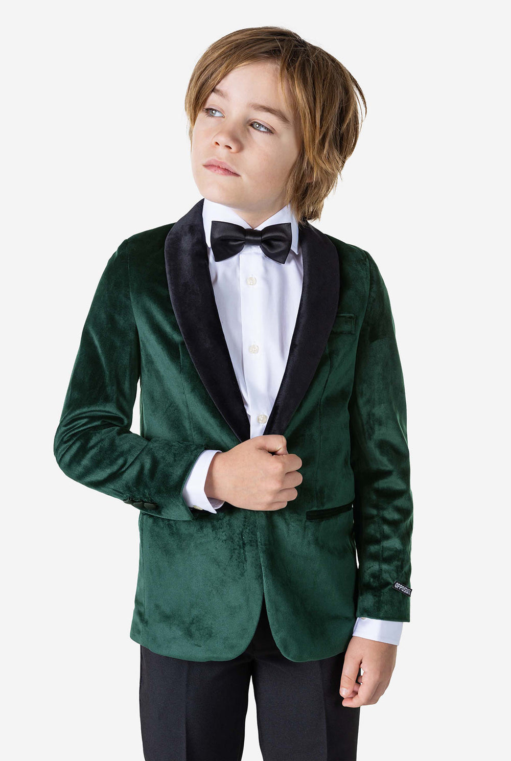 Jongen met groen fluwelen kerstdiner jasje