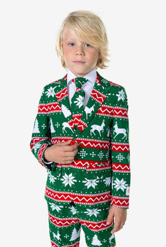 Kind draagt ​​groen kerstpak