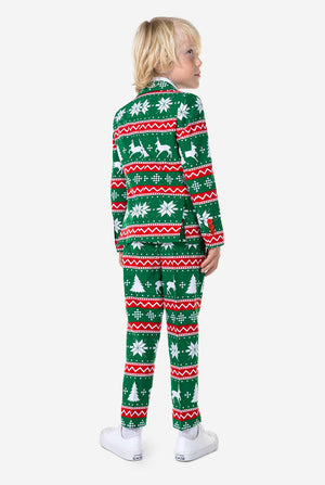 Kind draagt ​​groen kerstpak