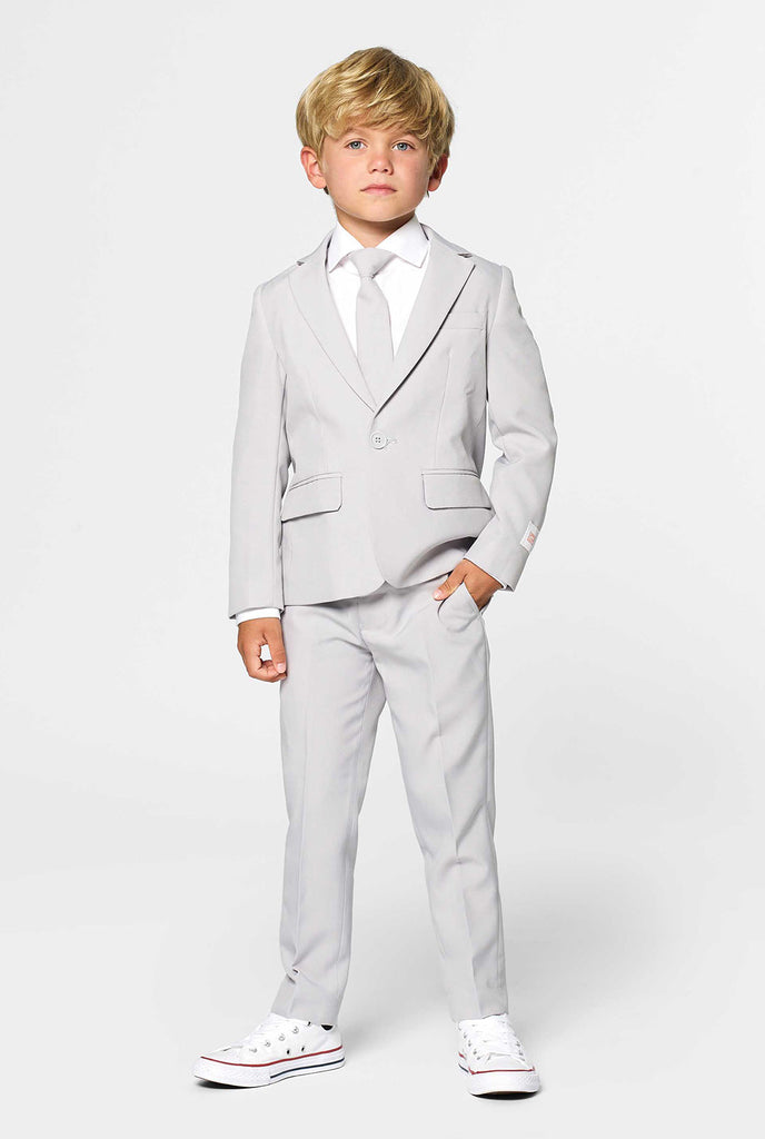 Vaste kleur groovy grijs pak voor kinderen gedragen door jongen