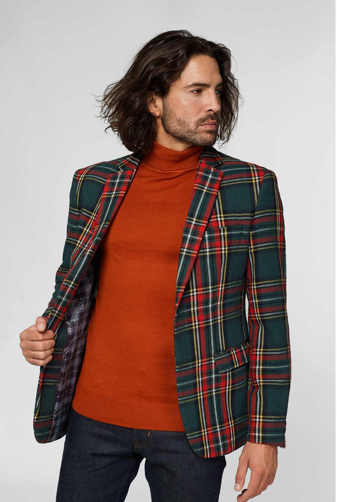 Rode en groene tartan blazer gedragen door de mens