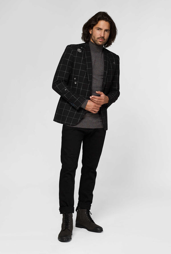 Zwart casual blazer met wit roosterpatroon gedragen door de mens die op de ontlasting zit