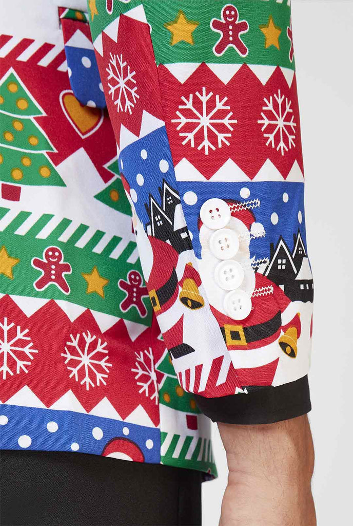 Rood Ugly Christmas Sweater Print Blazer gedragen door man ingezoomd op mouw