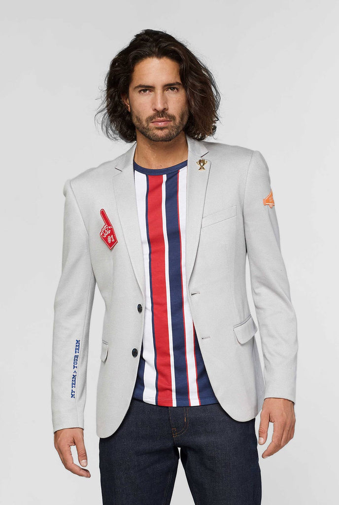 Grijze sportkleding casual blazer met sportpleisters gedragen door de mens