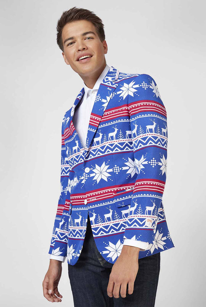 Blauw en rood kerstthema blazer gedragen door de mens