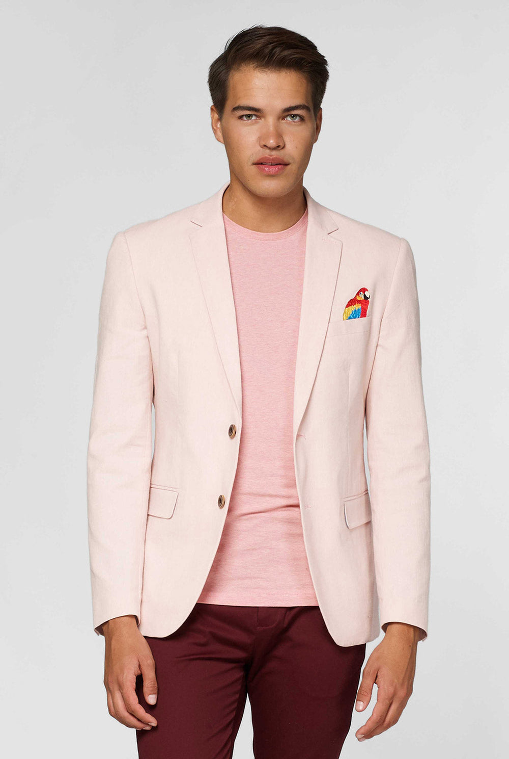 Roze casual blazer met papegaai borduurwerk gedragen door de mens