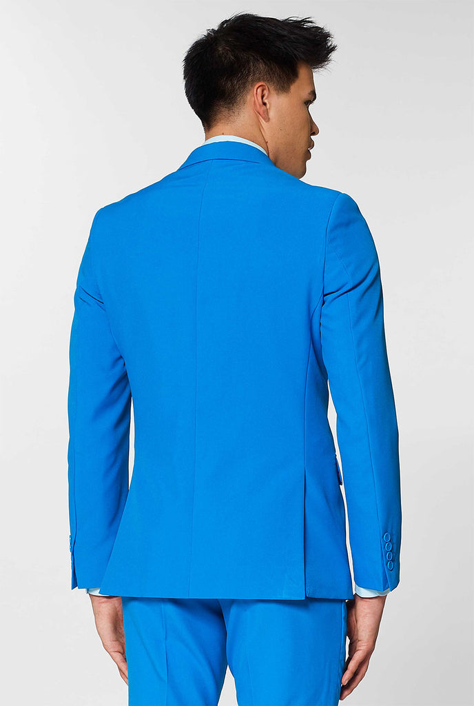 Man draagt ​​blauw herenpak, bekijk vanaf de achterkant