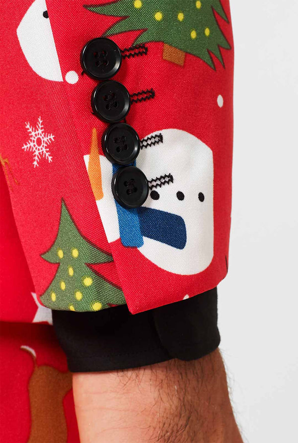 Man draagt ​​een rood kerstpak, mouw close -up