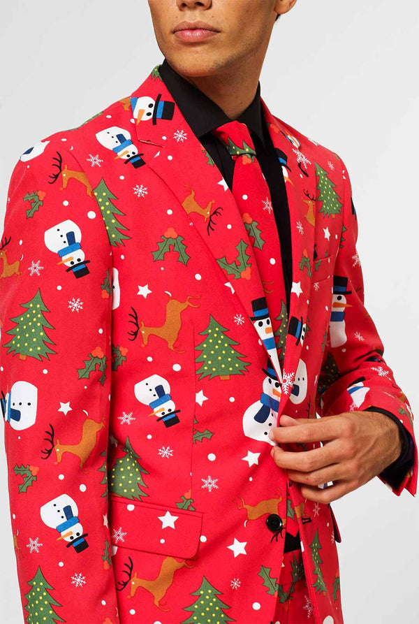 Man draagt ​​een rood kerstpak, close -up