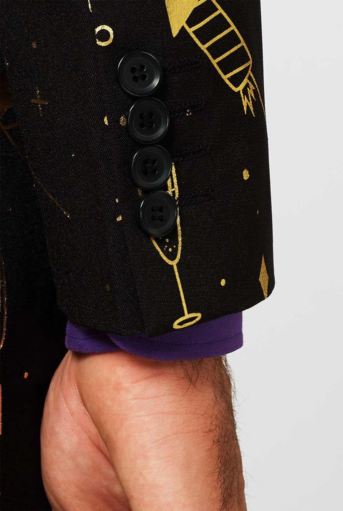 Zwarte pakhuls met gouden vuurwerkprint gedragen door de mens